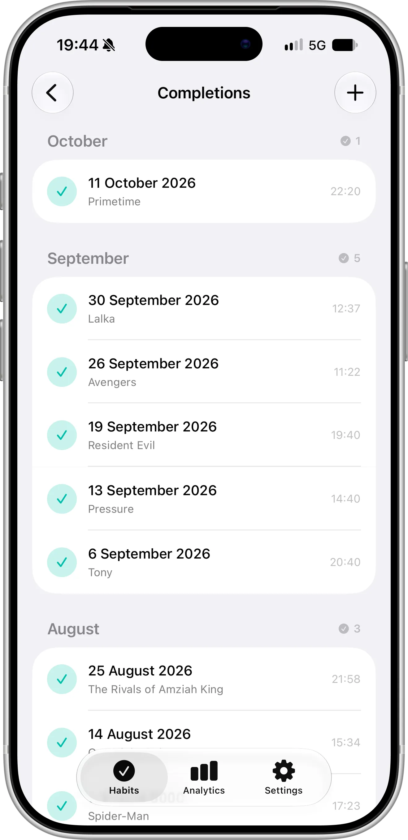 Completer completions list on iPhone grouped by month, each completion with its date, time and a note naming the movie watched