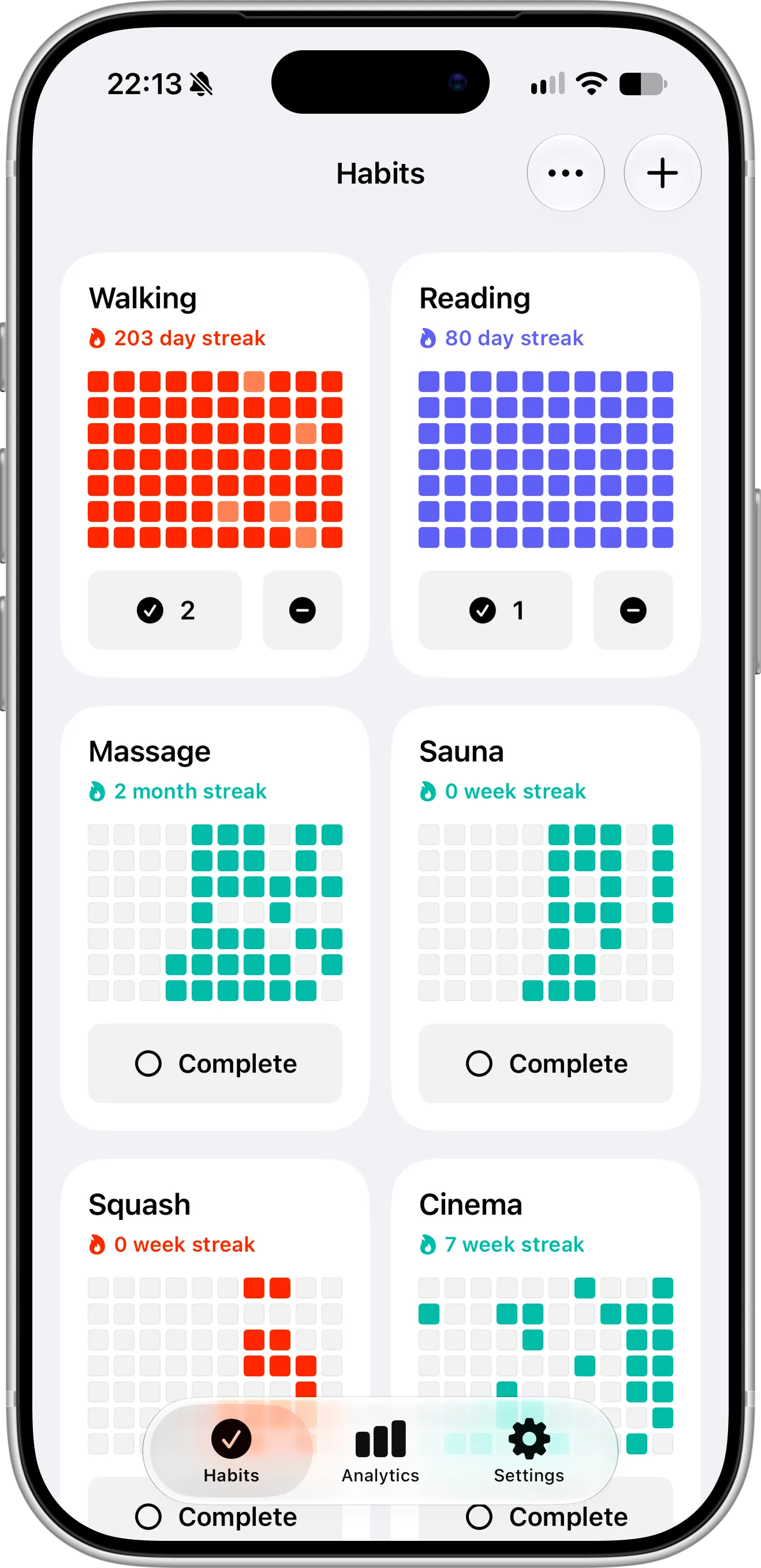 Completer on iPhone showing daily, weekly and monthly habits, each with its own grid of colored squares and a streak